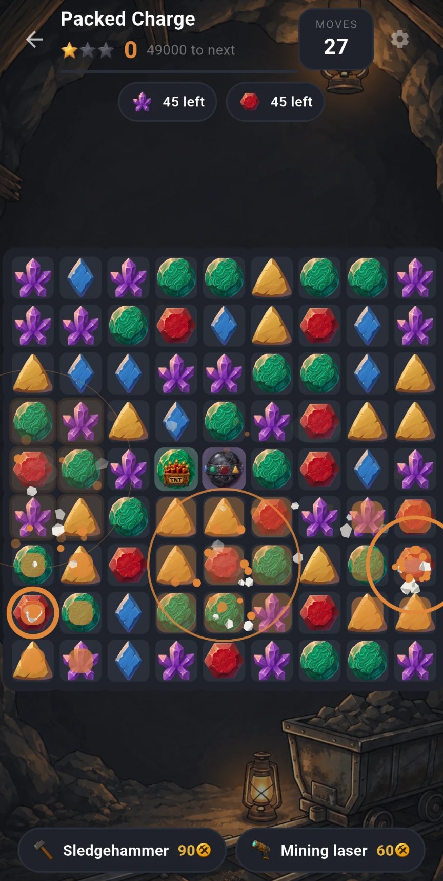 Packed Charge level: dynamite and bomb power-ups ready on the board